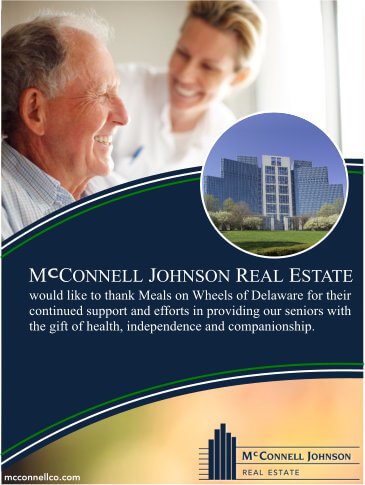 mcconnell johnson real estate ad with an eldery man and his daughter